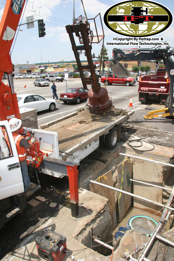 Hot Tapping the 54inch pipe, prepping for the linestop in Carson, California.